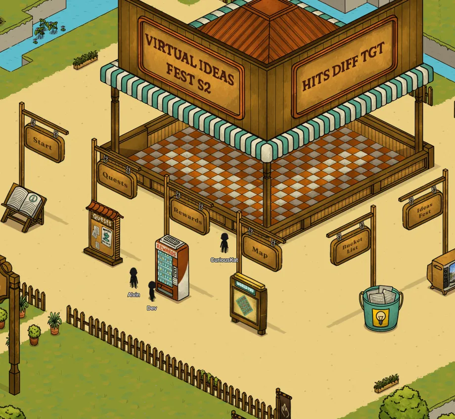 Isometric view of the Virtual Ideas Fest S2 hub on Pictoria, with signposts for Quests, Rewards, Map and Central Hub